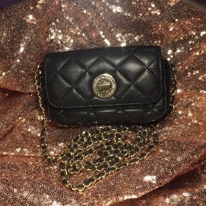 Bridgehampton Mini Genuine black leather hand bag.